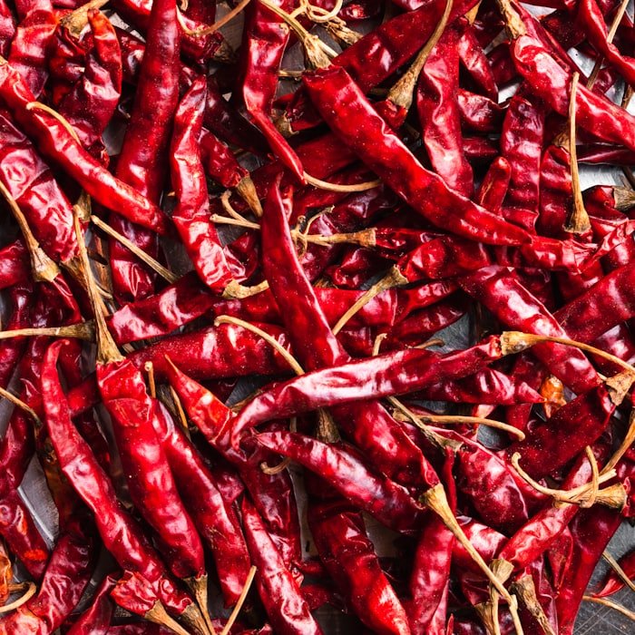 Dried red chillies laid out for grading