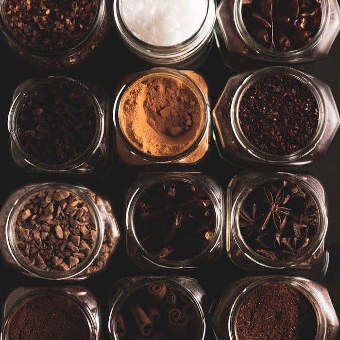 Jars of assorted ground and whole spices