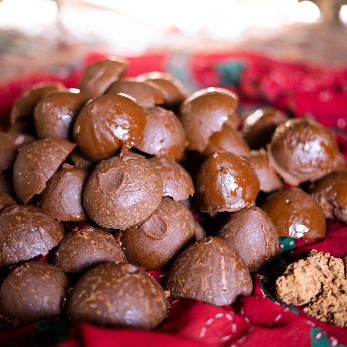 Traditional jaggery balls laid out on cloth